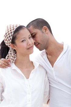 african man and asian woman lover on the beach