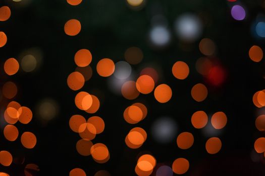 Colorful holiday abstract background in defocus photographed closeup