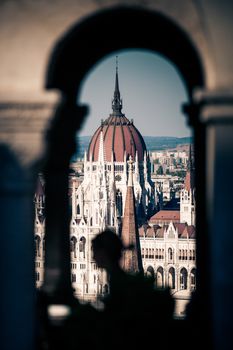 View of Hungarian Parliament Building with customers at Buda Castle restaurant, Budapest, Hungary