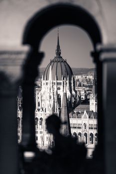 View of Hungarian Parliament Building with customers at Buda Castle restaurant, Budapest, Hungary