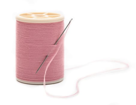 thread with needle isolated on white