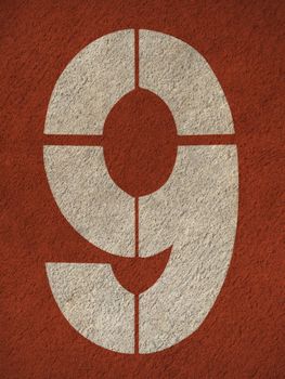 Numbers on red running track