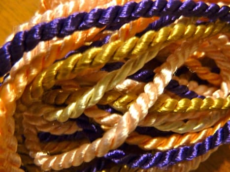 Bright coloured rope in a twisted pile