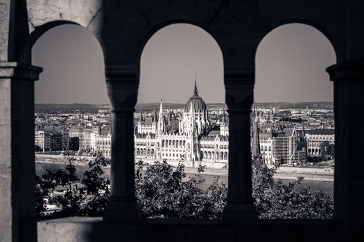 View of Hungarian Parliament Building with customers at Buda Castle restaurant, Budapest, Hungary