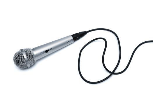 Microphone with a black cord on a white background