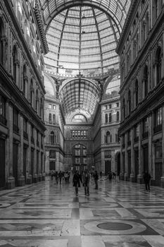 View of Galleria Umberto in Naples, a typical architecture of XIX century, black and white, portrait