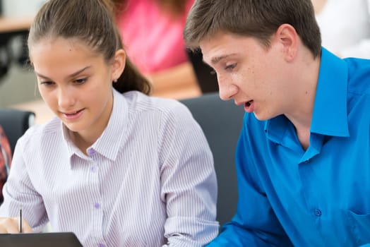 portrait of students in the classroom, teaching at the University of