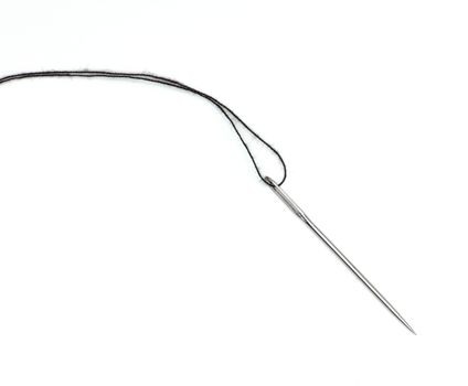 black thread and needle isolated on white