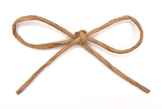 String tied in a bow on white