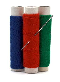Needle and thread isolated over white background