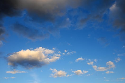 Cloudscape, Colored Clouds at Sunset near the Ocean