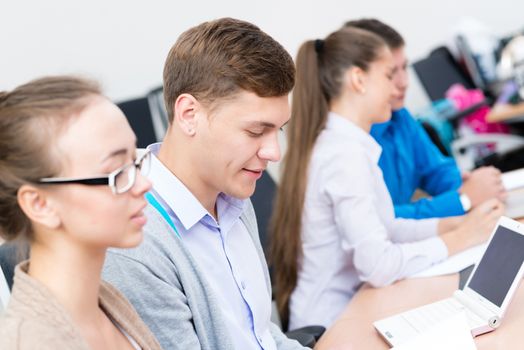 portrait of students in the classroom, teaching at the University of