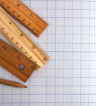 Millimeter paper, ruler and pencil