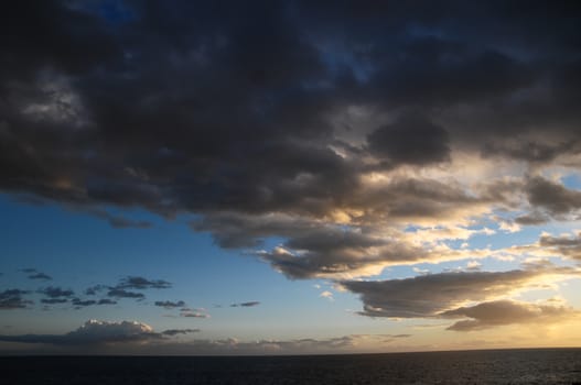 Cloudscape, Colored Clouds at Sunset near the Ocean