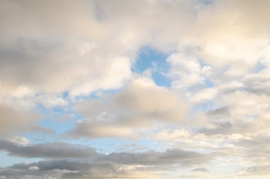 Cloudscape, Colored Clouds at Sunset near the Ocean