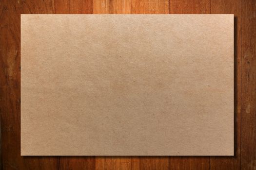 Crumpled paper on wood wall