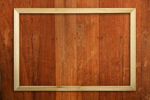 Wood picture frame on wood panel