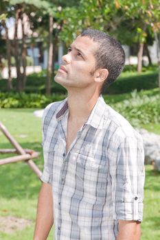 Portrait of young attractive man, outdoors