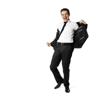 Man takes off his jacket. Isolated on white. 