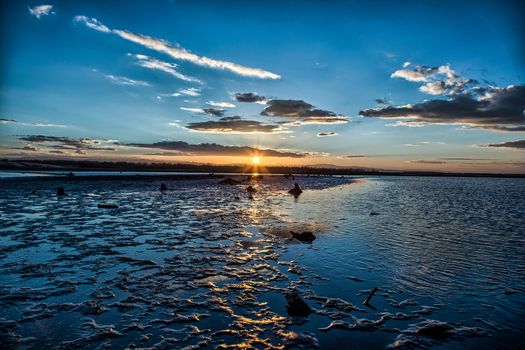 Mud and sand at the beach of the lake