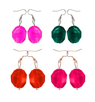 Earrings made and glass isolated on white background in different colors. imitation pearl. Collage. 