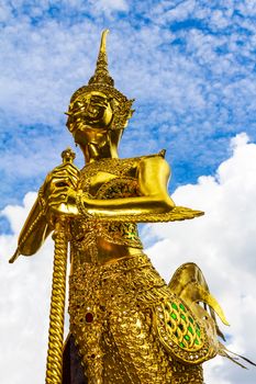 Gold Statue, Phrasrirattana Sasadaram the Temple of the Emerald Buddha at Bangkok Thailand