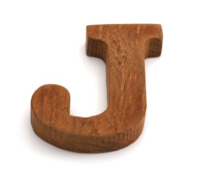 Alphabet made from wood on white