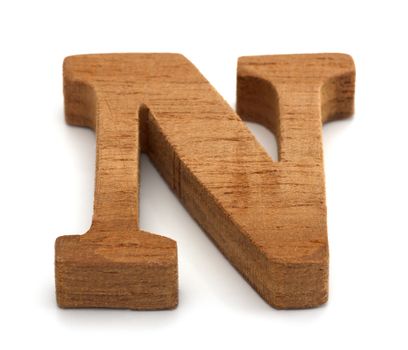 Alphabet made from wood on white