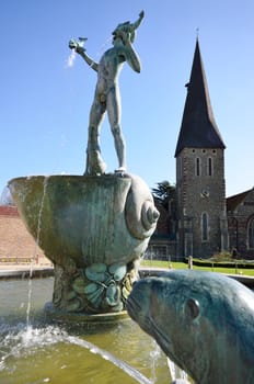Fountain with church in background