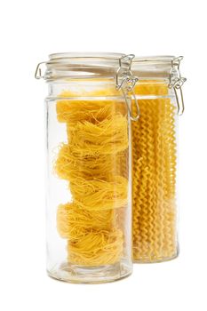 pasta in glass jar on a white background