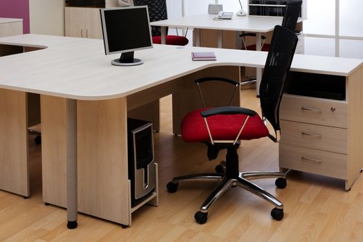 Beautiful and new red chair at modern office