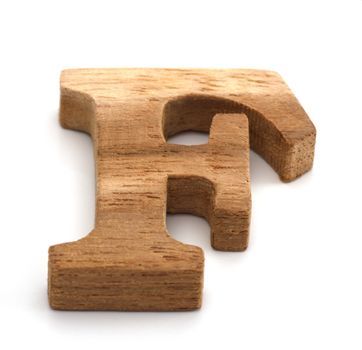Alphabet made from wood on white