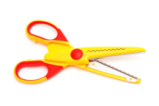 Modern yellow scissors on a white background