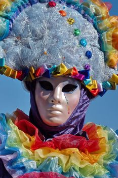 Colorful person at the 2014 venetian carnival of Annecy, France