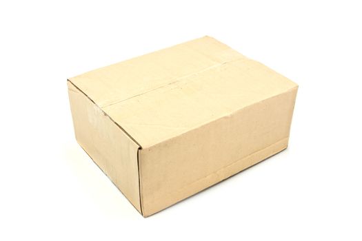 Close brown paper box on white