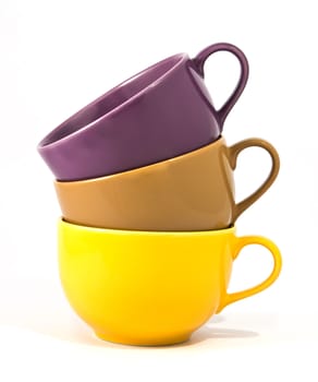 Set of colorful cups on white background