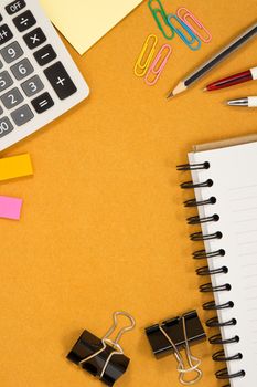 school, office accessories on brown paper