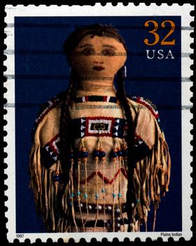 USA - CIRCA 1997 : Stamp printed in the USA shows Plains Indian doll, circa 1997