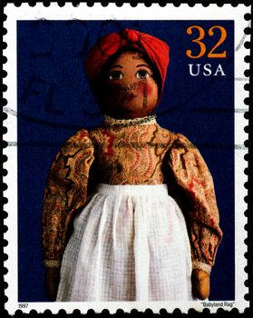 USA - CIRCA 1997 : Stamp printed in the USA shows Babyland Rag doll, circa 1997