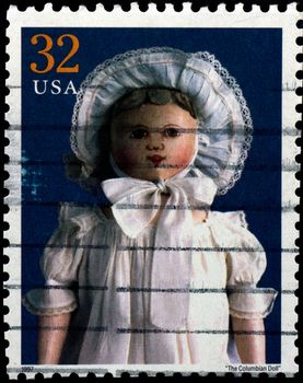 USA - CIRCA 1997 : Stamp printed in the USA shows The Columbian Doll, circa 1997