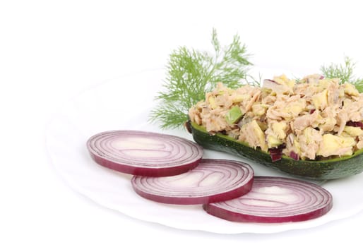 Avocado salad and tuna. Isolated on a white background.