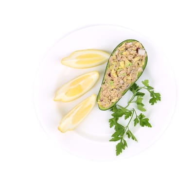 Avocado salad and tuna. Isolated on a white background.