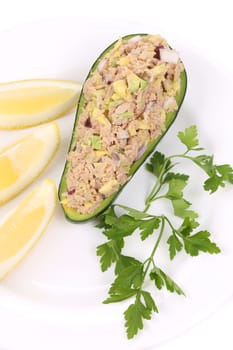 Avocado salad and tuna. Isolated on a white background.