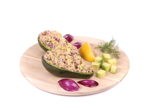 Avocado salad and tuna. Isolated on a white background.
