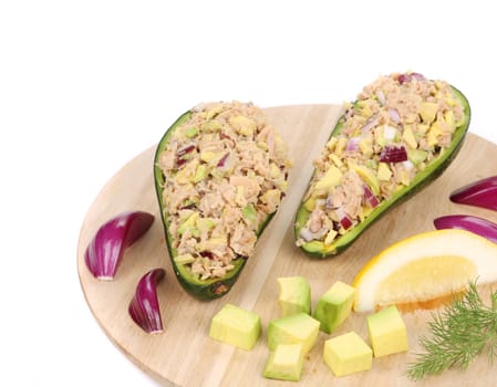 Avocado salad and tuna. Isolated on a white background.