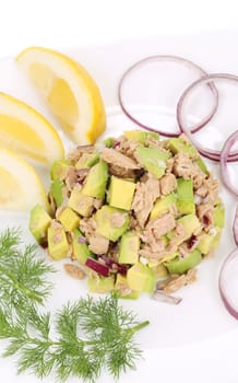 Avocado salad and tuna. Isolated on a white background.