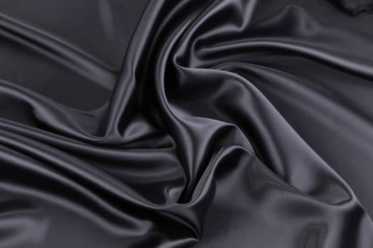 Black silk background.