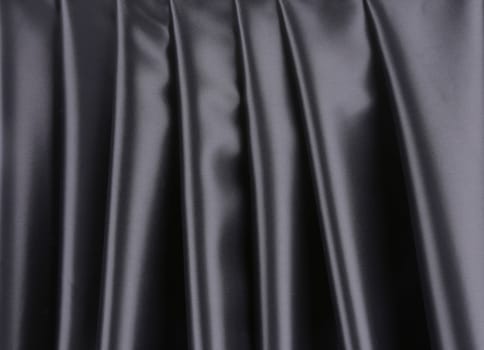 Black silk background.