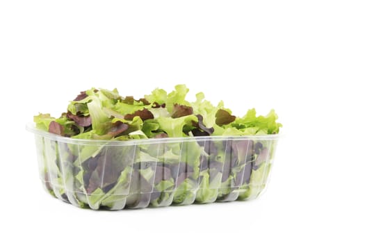 Fresh mixed salad leaves. Isolated on a white background.