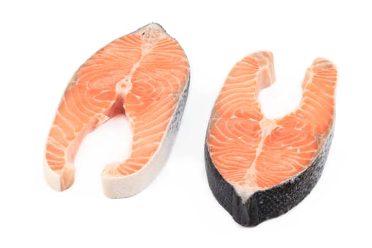 Fresh salmon steaks. Isolated on a white background.